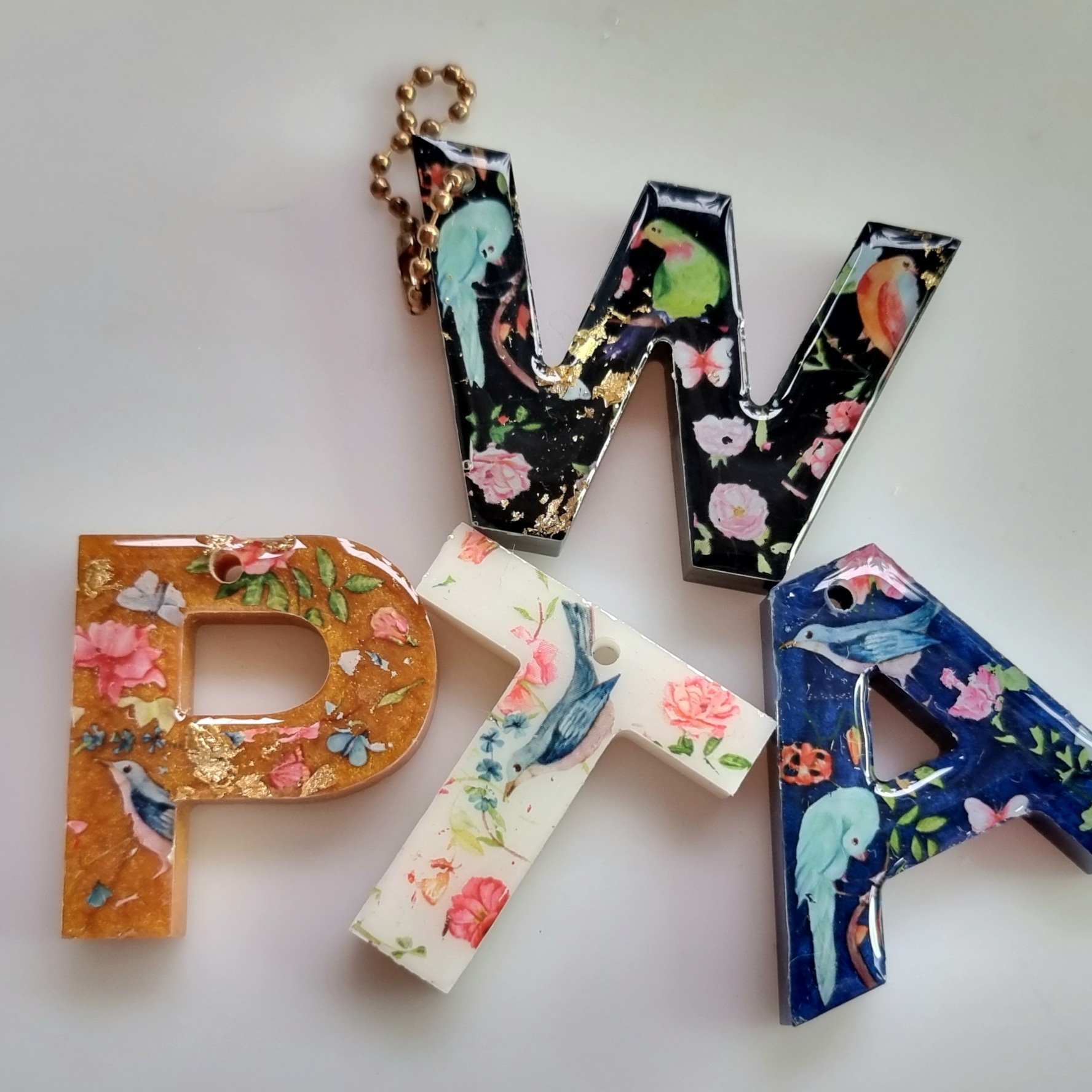 Resin letters made with foil motives