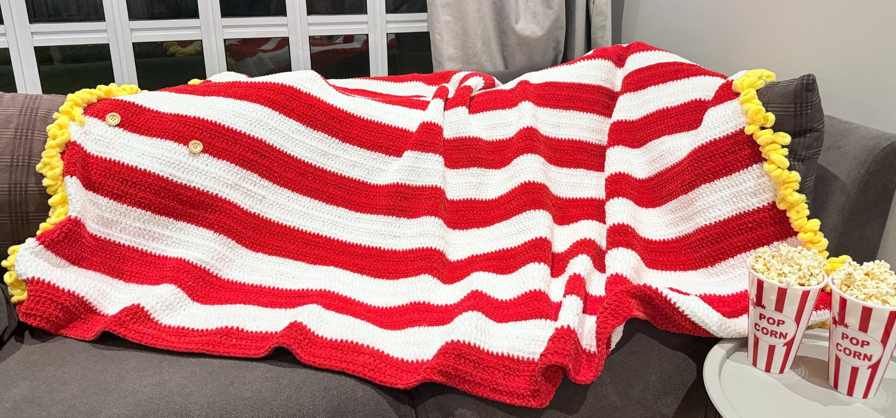 tv blanket as a popcorn bucket